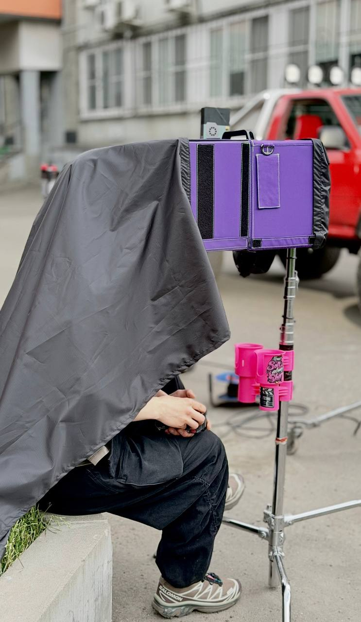 Custom sun hood — on set